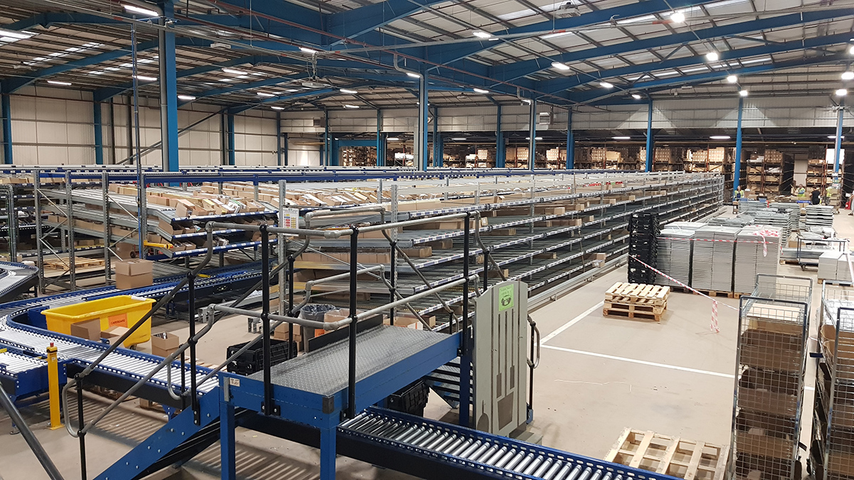 Conveyor Units roller conveyor used for order picking in 3pl third party logistics warehouse with walkover