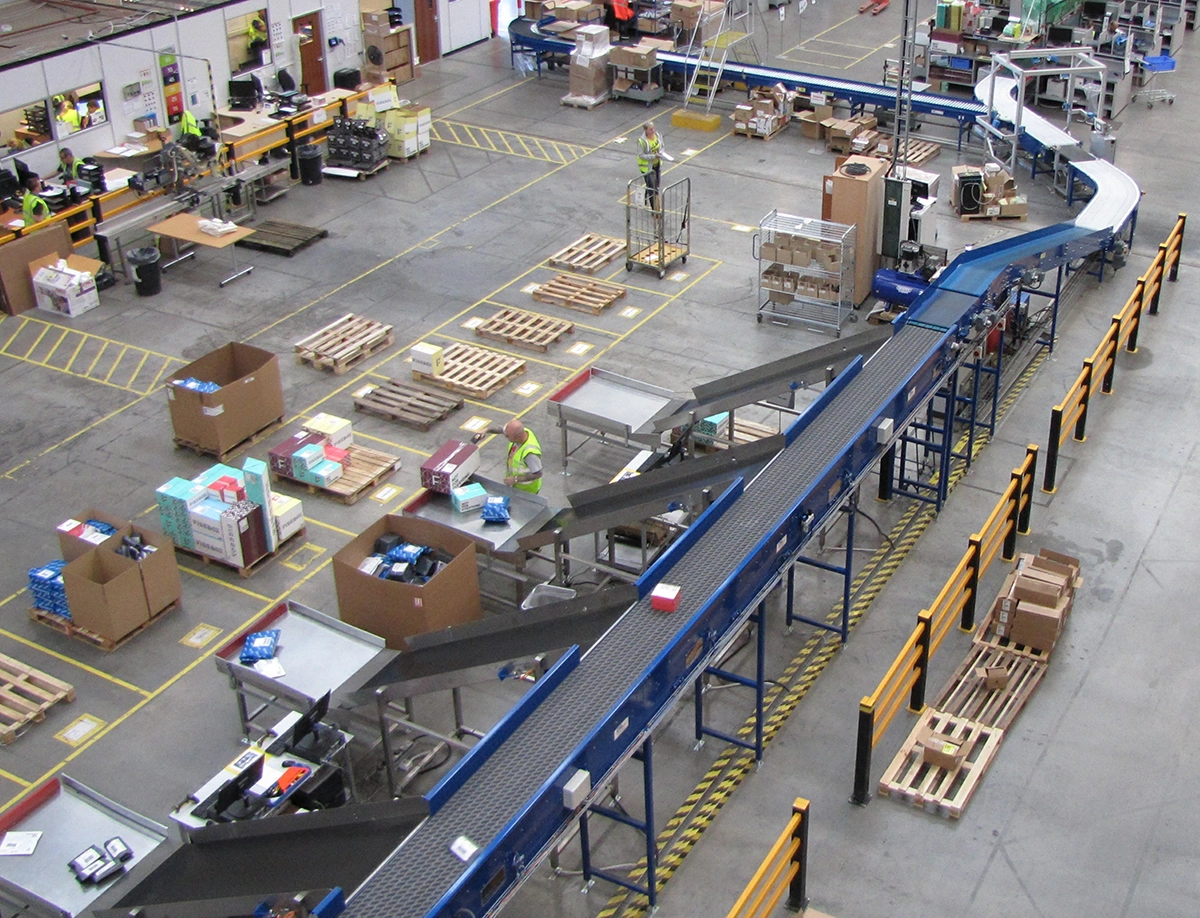 Warehouse operatives packing orders at City Electrical Factors