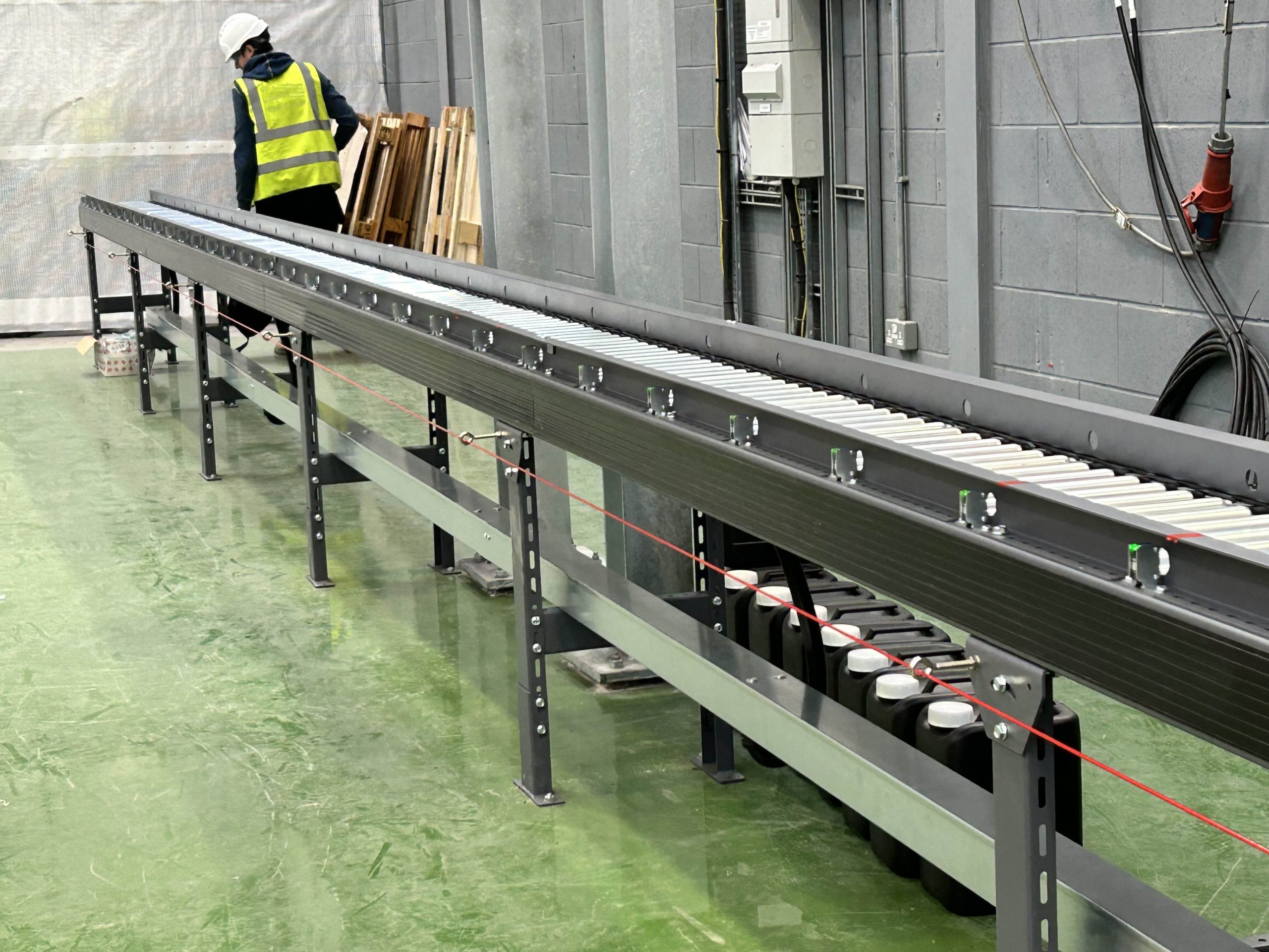 Conveyor Units roller conveyor used for order picking in 3pl third party logistics warehouse with walkover